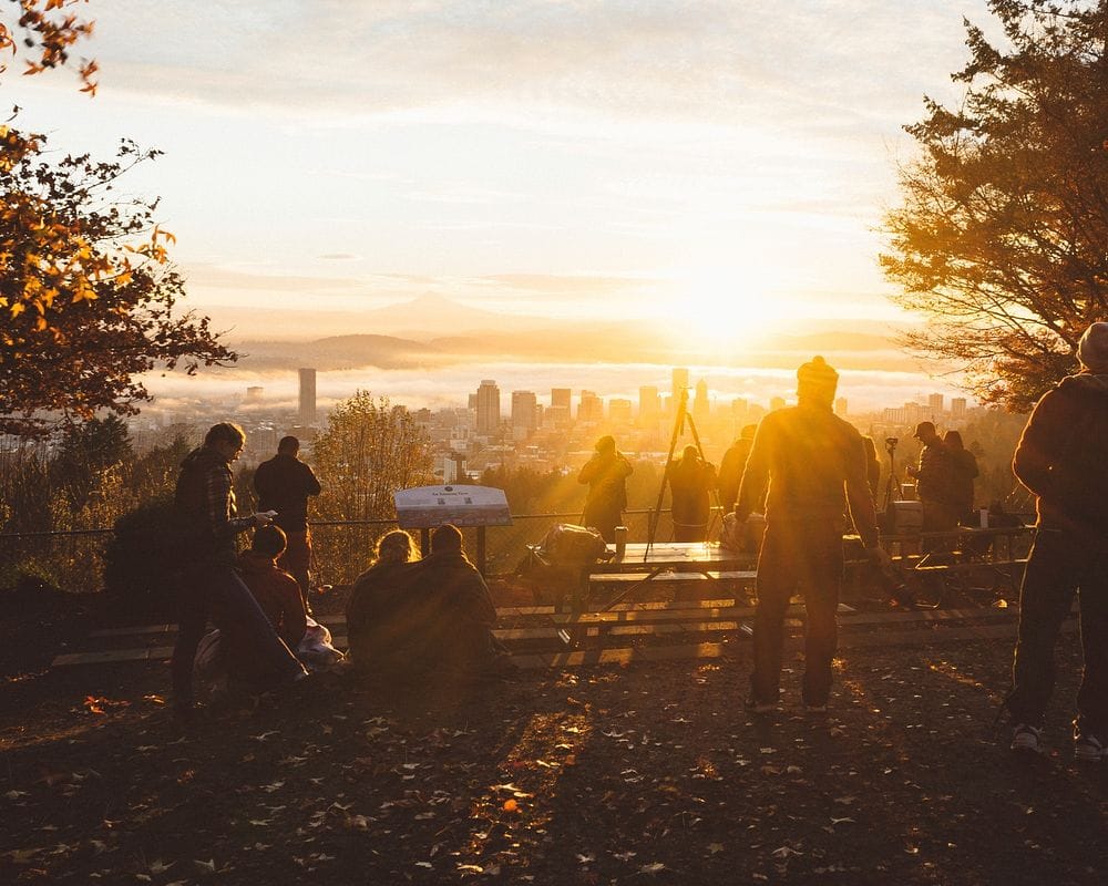 Group looking out over the Riverside County skyline at dusk